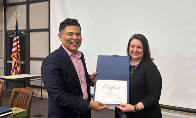 Completion certificate for LLNJ’s PM Fundamentals + AI Integration Bootcamp, presented by Sam Sena (left) to Ashley Foglia, Bradley Beach Free Public Library